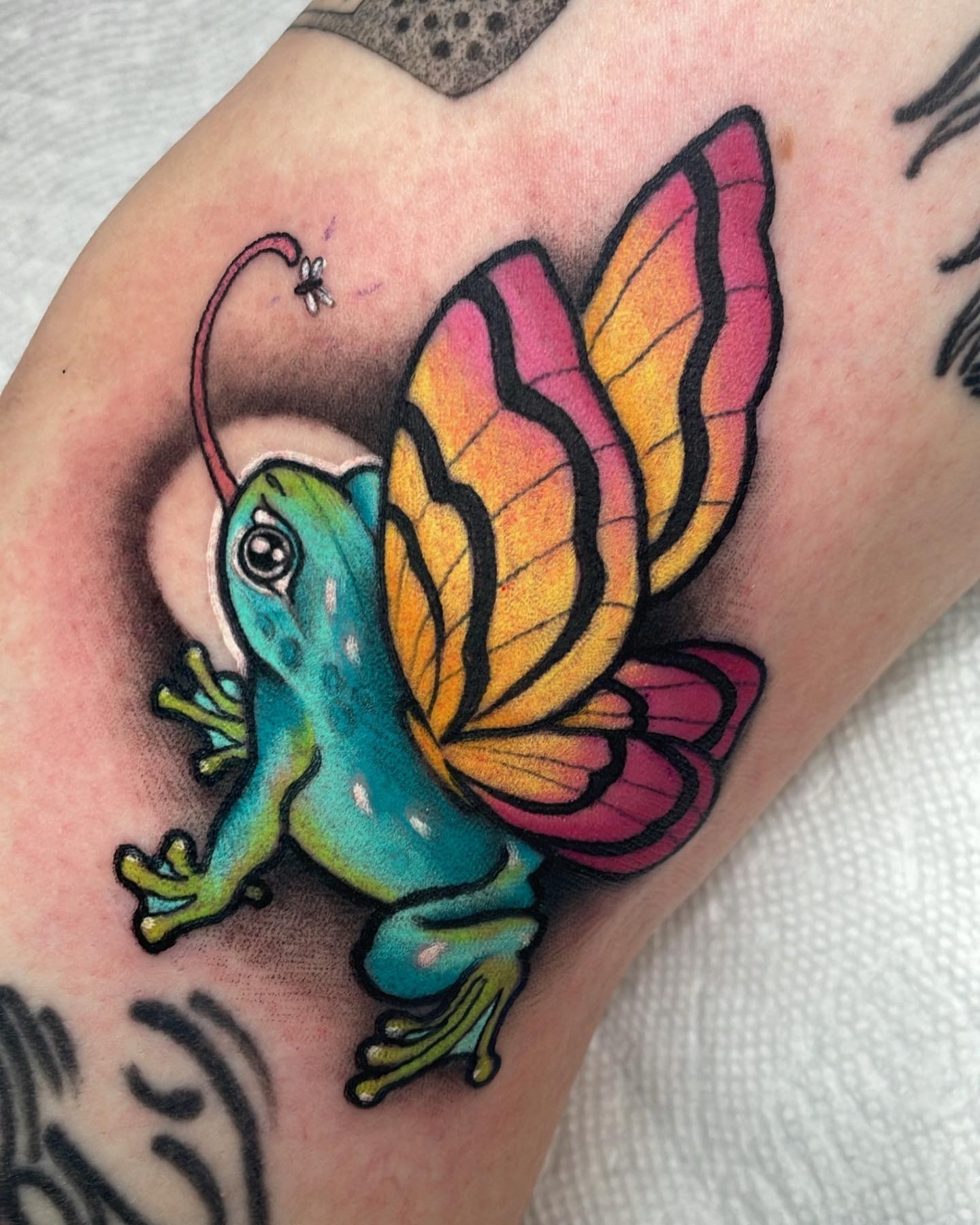 Frog with butterfly wings, whimsical neo traditional tattoo by Mariella