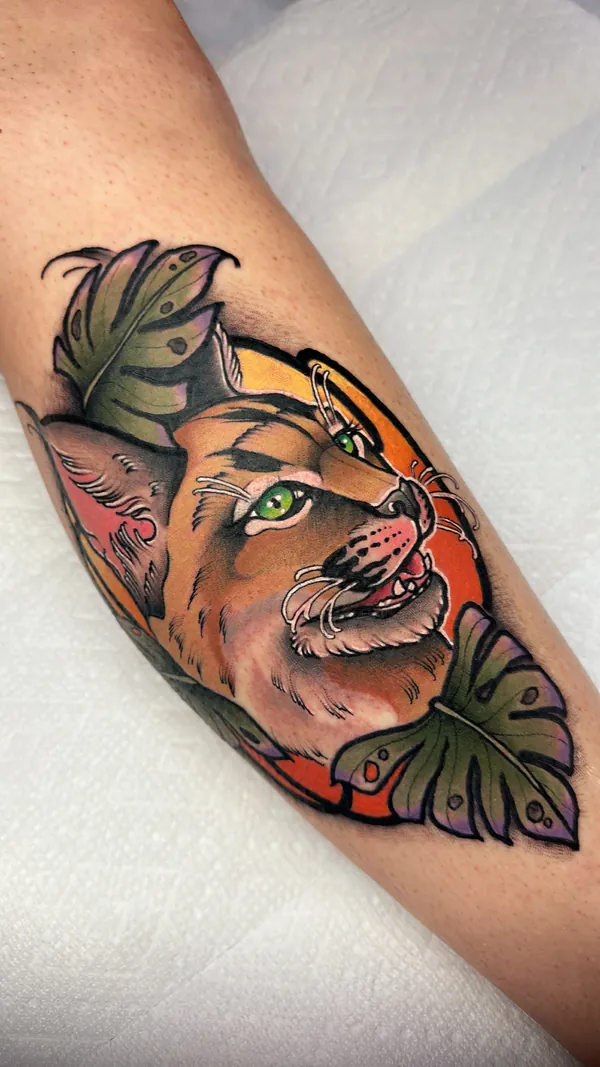 Cougar with monstera leaves, neo traditional tattoo by Mariella