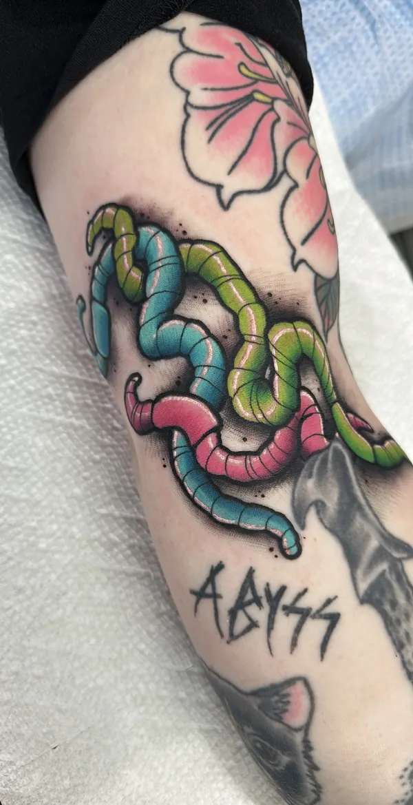 Snake with hibiscus flower, neo traditional tattoo by Mariella